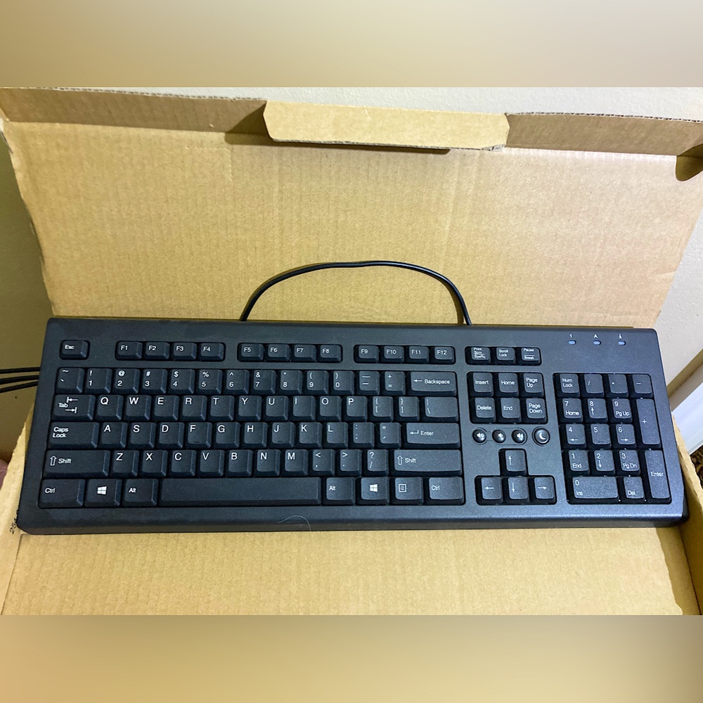 Brand new keyboard and ergonomic dual grip mouse !! Keyboard still in box !